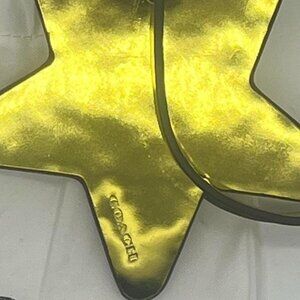 Gold Coach bag tag
